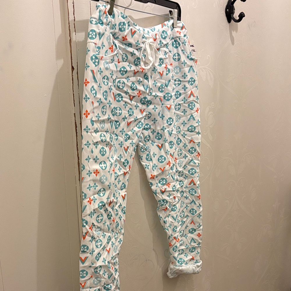 Stylish jeggings w stretch & roll up hem w signature print NWT L/XL